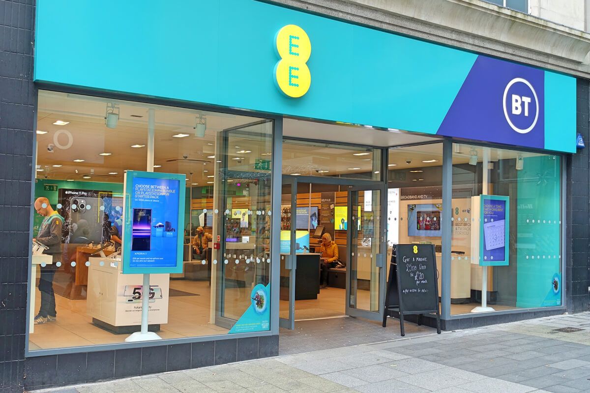 Glazed shopfront with illuminated fascia for an EE and BT store