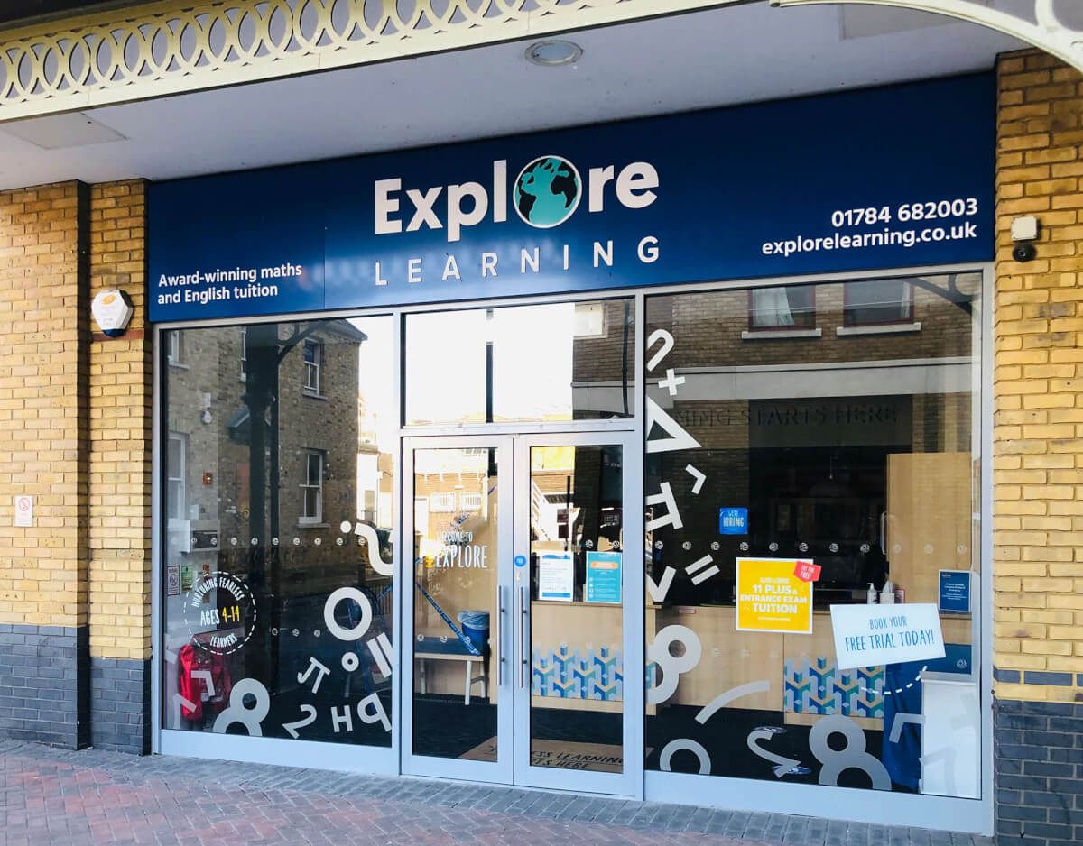 Aluminium shopfront with double entrance doors and signage at an Explore Learning centre