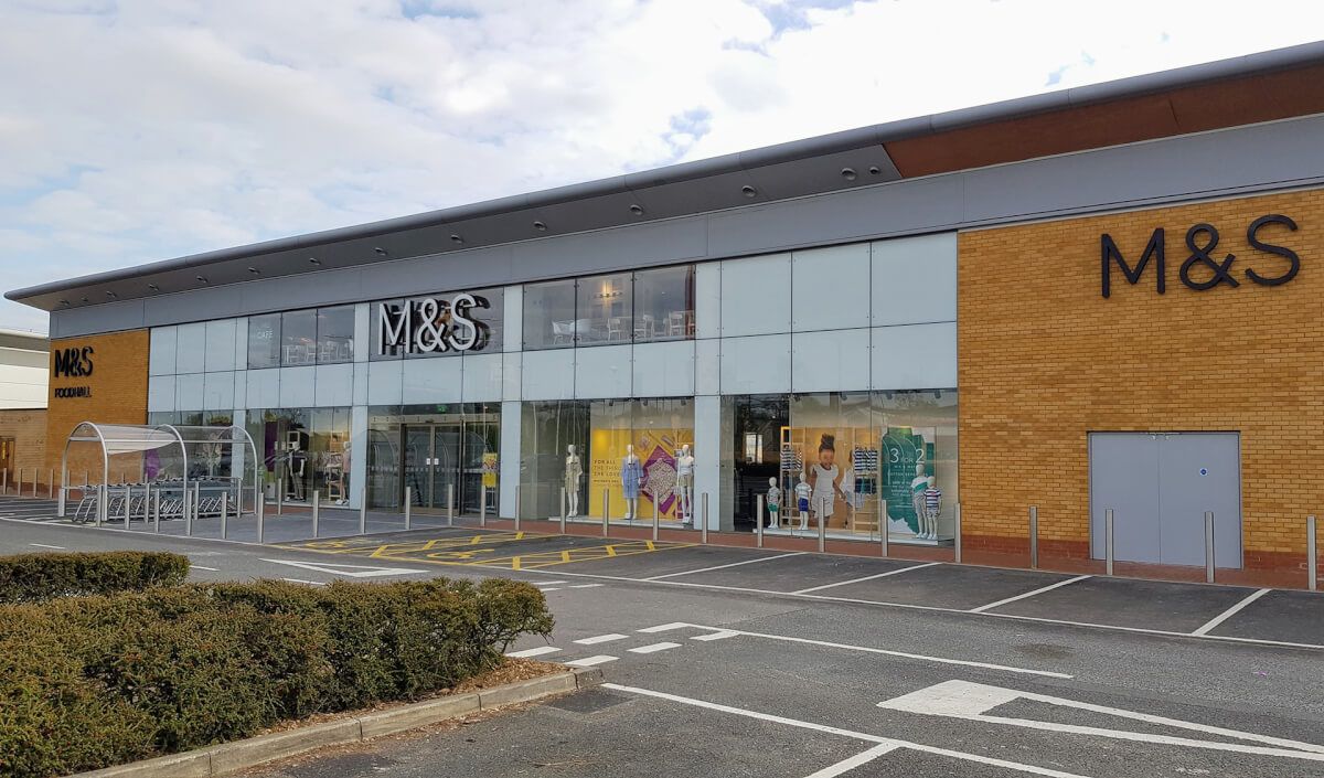 Aluminium curtain walling with large glazed panels on a Marks & Spencer store