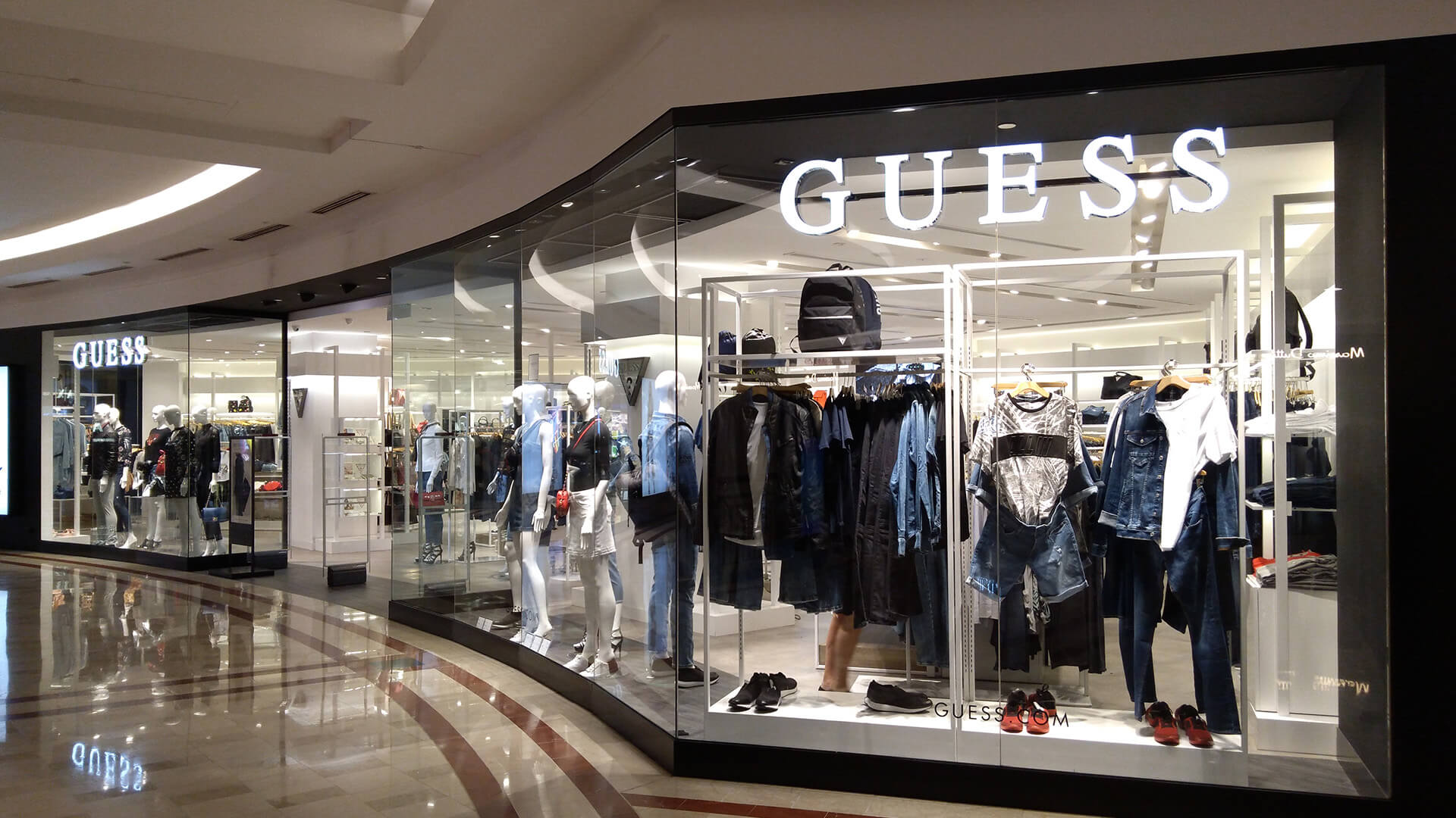 Glass shopfront installation for a Guess store